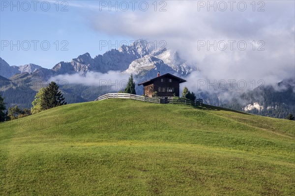 Hill with wooden house, Eckbauer, Werdenfelser Land, Garmisch-Partenkirchen, Upper Bavaria, Bavaria, Germany, Europe