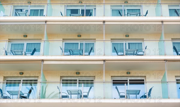 Balconies of a hotel on the seafront promenade in Sitges, Spain, Europe