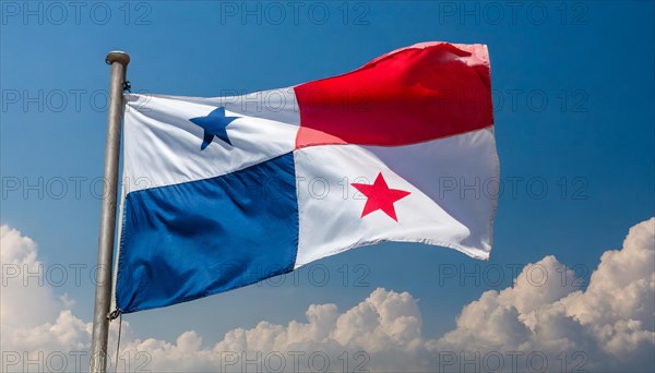 The flag of Panama flutters in the wind, isolated against a blue sky