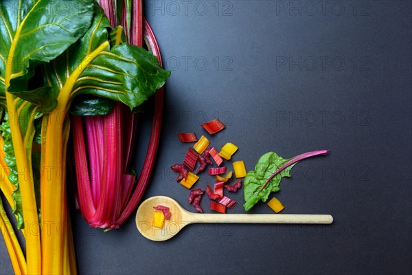 Swiss chard, chopped stems and wooden spoons, Beta vulgaris