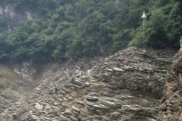 Cruise ship on the Yangtze River, Hubei Province, China, Asia, Layered cliff with green plants and traces of erosion, Yichang, Asia