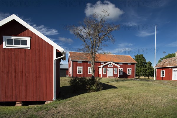 Falun red or Swedish red painted houses, farm, Geta, Aland, or Aland Islands, Gulf of Bothnia, Baltic Sea, Finland, Europe