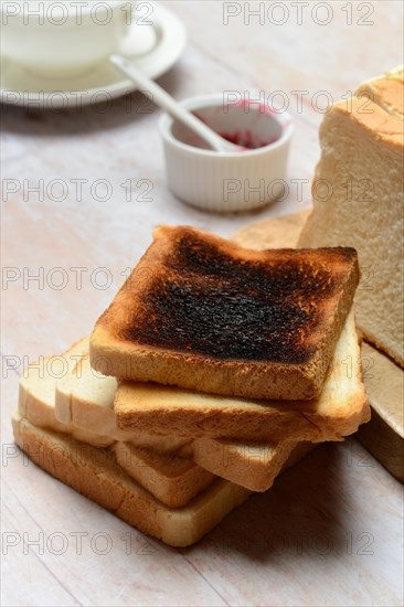 Burnt slice of toast with toast, toast