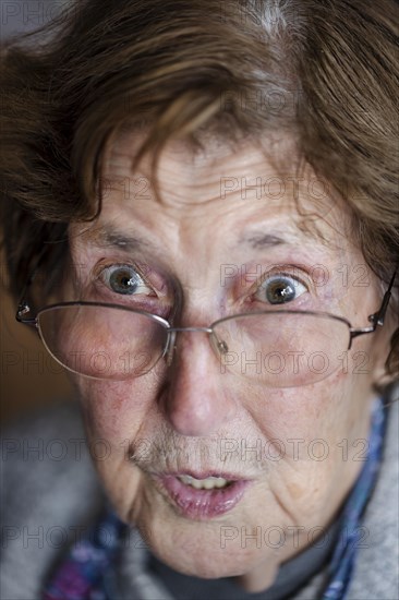 Portrait of a frightened looking senior citizen, close-up, Cologne, North Rhine-Westphalia, Germany, Europe