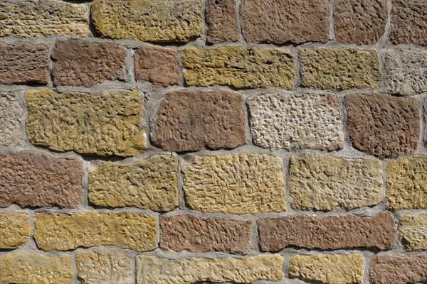 Wall of yellow and red Sanstein, sandstone wall, Rhineland-Palatinate, Germany, Europe