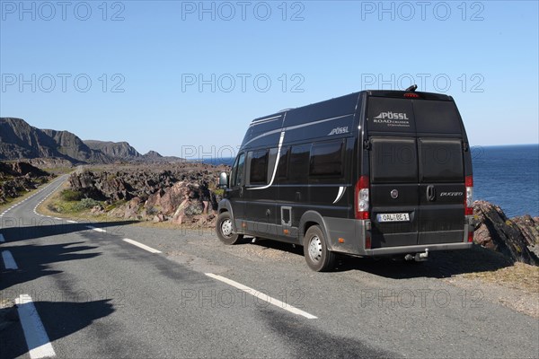 Camper, motorhome on the single-lane coastal road to Hamningberg on the Barents Sea, Lapland, Northern Norway, Scandinavia