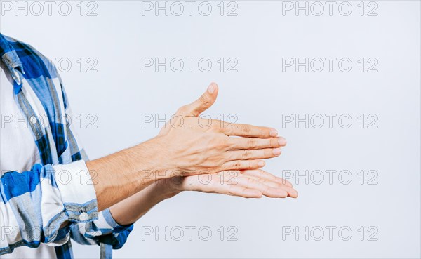 Hands gesturing STOP in sign language. Close up of hands gesturing STOP in sign language