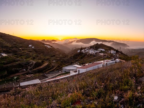 Sunset near Roque Nublo in Gran Canaria and Tenerife in the background, Canary Islands