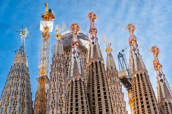 Towers of the Sagrada Familia basilica under construction, Roman Catholic basilica by Antoni Gaudi in Barcelona, Spain, Europe