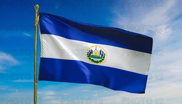 The flag of El Salvador flutters in the wind, isolated against a blue sky