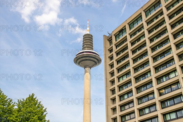 View of a television tower, modern radio tower during the day in Frankfurt am Main, Hesse Germany