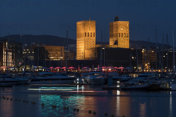 Illuminated Oslo City Hall, Tjuvholmen, Aker Brygge, Frogner, Oslo, Norway, Europe