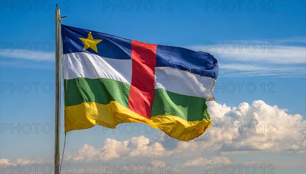 The flag of the Central African Republic, fluttering in the wind, isolated, against the blue sky