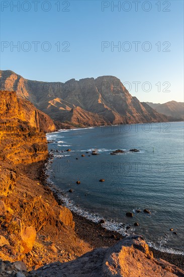 Cliffs and the coast of Agaete at summer sunset in Gran Canaria. Spain