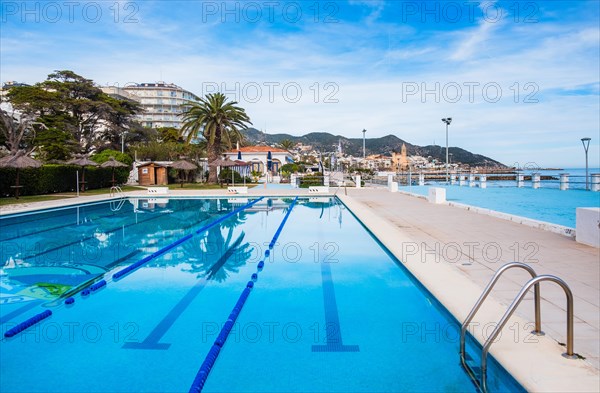 Swimming pool on the beach in Sitges, Spain, Europe