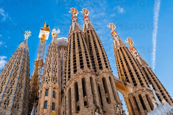 Towers of the Sagrada Familia basilica under construction, Roman Catholic basilica by Antoni Gaudi in Barcelona, Spain, Europe