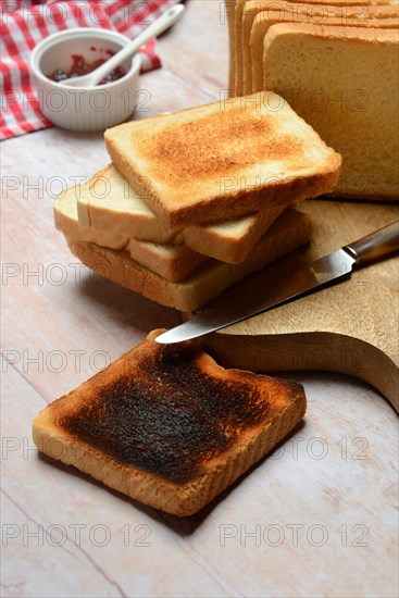 Burnt slice of toast with toast, toast