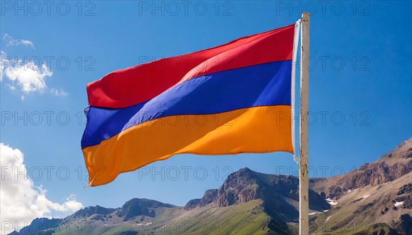 The flag of Armenia flutters in the wind, isolated against a blue sky