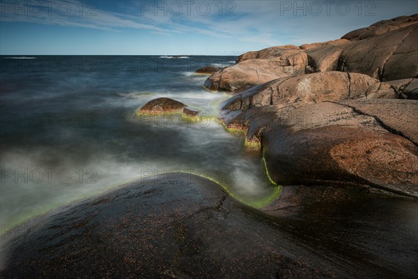 Red granite, rocky coast, surf, long exposure, Havsvidden, Geta, Aland, Aland Islands, Finland, Europe