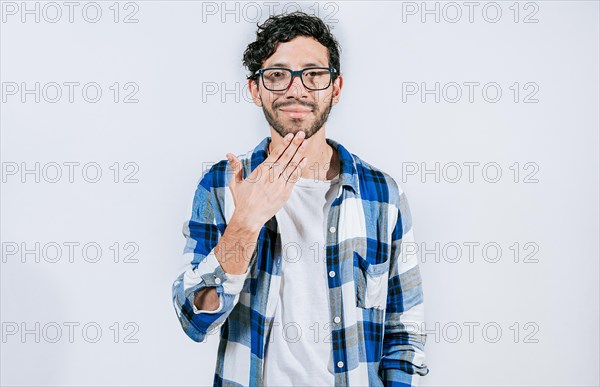 Person making THANK YOU gesture in sign language isolated. Man showing THANK YOU gesture in sign language