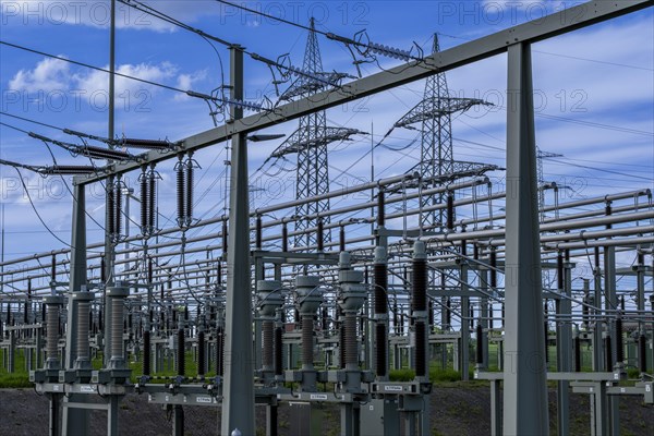 Power pylons with high-voltage lines and insulators at the Avacon substation in Helmstedt, Helmstedt, Lower Saxony, Germany, Europe