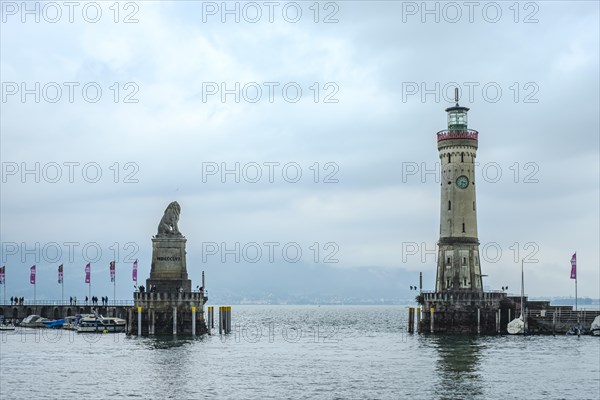 Harbour entrance with the Bavarian Lion and the lighthouse, Lindau (Lake Constance), Bavaria, Germany, Europe