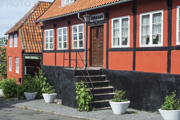 Typical colored red houses on Bornholm island, Baltic Sea, Denmark, Scandinavia, Northern Europe, Europe