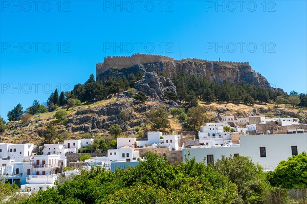 View of the town and acropolis of Lindos in Rhodes
