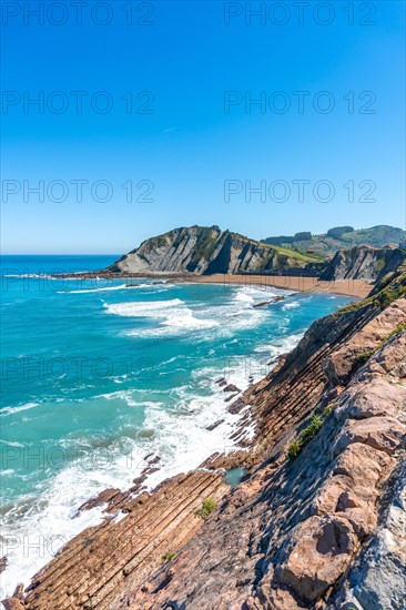 View of Itzurun beach from Cala de Algorri in the Flysch Basque Coast geopark in Zumaia, Gipuzkoa