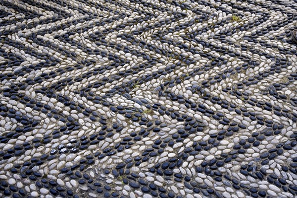 Pebble pavement, background, texture, Symi Island, Greece, Europe