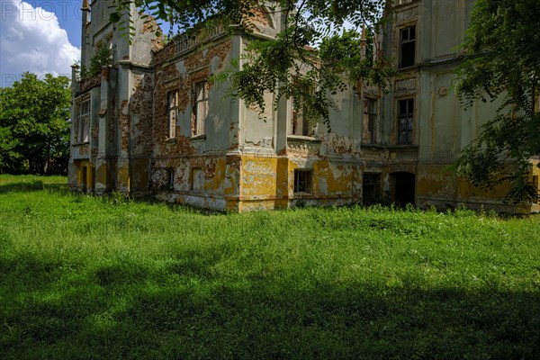 The ruins of Rosen Castle, a neo-Gothic building from the second half of the 19th century, are one of the architectural monuments of Roznow (Rosen), Wolczyn Commune, Kluczbork District, Opole Voivodeship, Poland, Europe