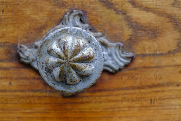 Application on wood, antiqued door fitting on a historic front door, Old Town Lindau (Lake Constance), Bavaria, Germany, Europe