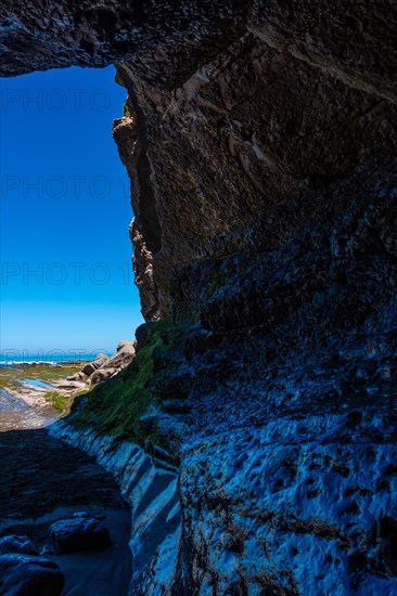 Sea cave in Algorri cove on the coast in the Zumaia flysch without people, Gipuzkoa. Basque Country