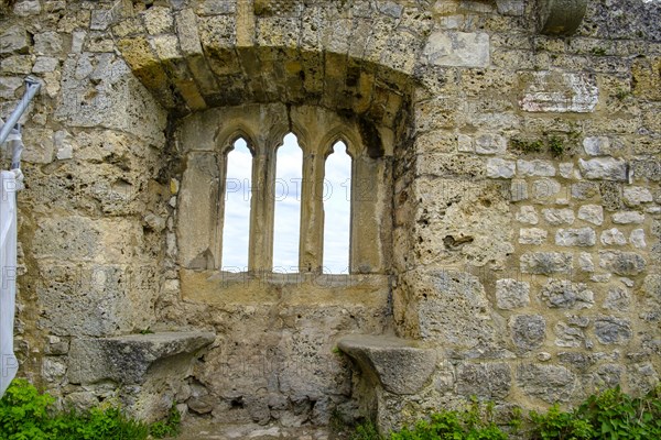 Gothic tracery window in an old fragment of wall, ruins of the medieval Hohenurach Castle, Bad Urach, Swabian Alb, Baden-Wuerttemberg, Germany, Europe