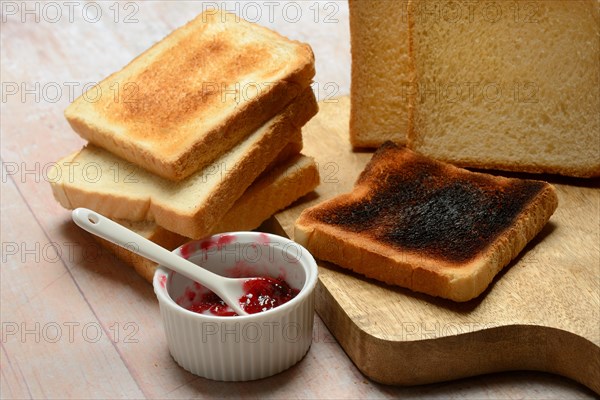 Burnt slice of toast with toast, toast