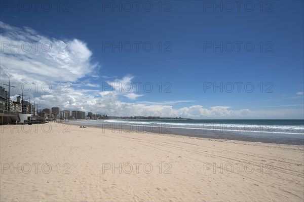 Beach of Les Sables-d'Olonne, left houses with promenade, Vandee, France, Europe