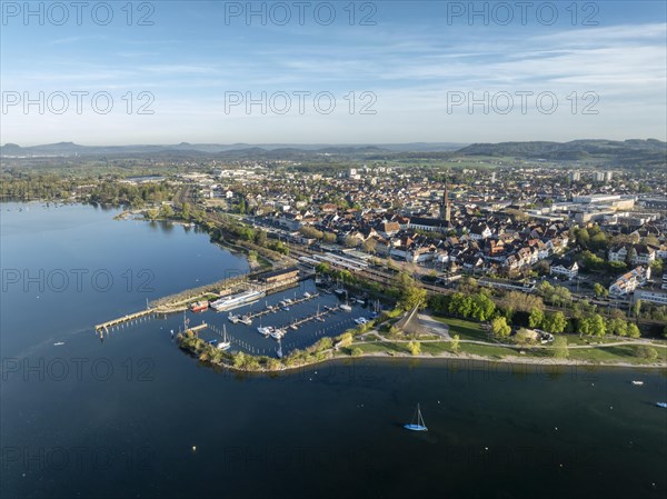 Aerial view of the town of Radolfzell on Lake Constance with the Waeschbruckhafen, harbour pier and concert sail, on the horizon the Hegauberge, district of Constance, Baden-Wuerttemberg, Germany, Europe