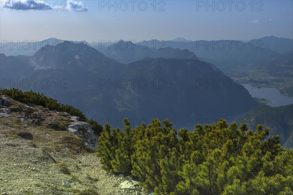 Amazing mountains panorama from 5 Fingers viewing platform in the shape of a hand with five fingers on Mount Krippenstein in the Dachstein Mountains of Upper Austria, Salzkammergut region, Austria, Europe