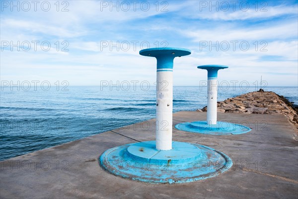 Showers on the beach in Sitges, Spain, Europe