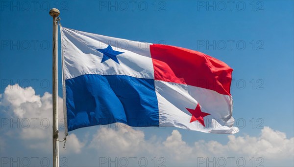 The flag of Panama flutters in the wind, isolated against a blue sky