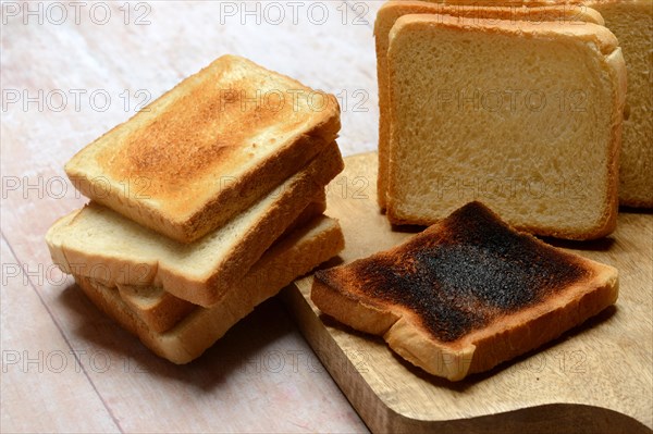 Burnt slice of toast with toast, toast