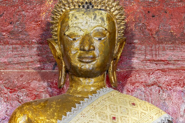 Golden Buddha statue, Bhumispara-mudra, Buddha Gautama at the moment of enlightenment, Wat Long Koon, Luang Prabang, Laos, Asia