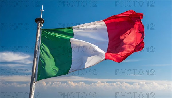 The flag of Italy flutters in the wind, isolated against a blue sky