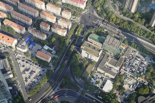 View from the 632 metre high Shanghai Tower, nicknamed The Twist, Shanghai, People's Republic of China, Complex intersection with flowing traffic seen from the air, Shanghai, China, Asia