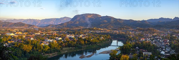 Panorama over Luang Prabang with Nam Khan River and Wat Phol Pao in the background, Laos, Asia