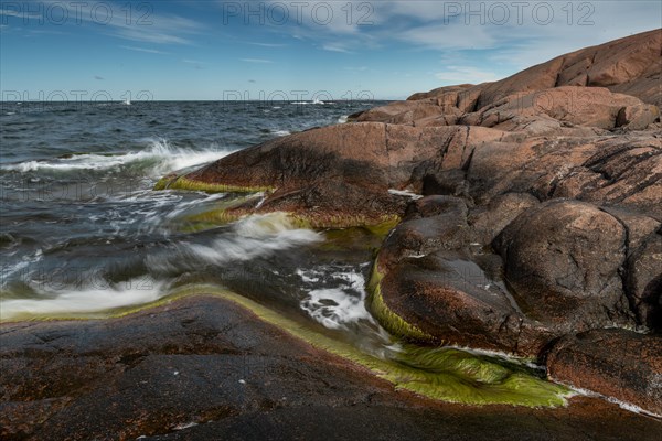 Red granite, rocky coast, surf, long exposure, Havsvidden, Geta, Aland, Aland Islands, Finland, Europe