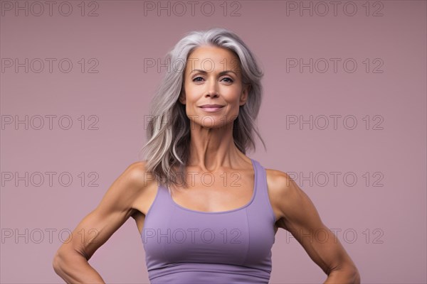 Mature toned woman with muscular arms and gray hair in sport clothes. KI generiert, generiert, AI generated
