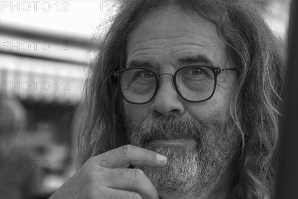 Portrait of a man with beard and glasses, Genoa, Italy, Europe