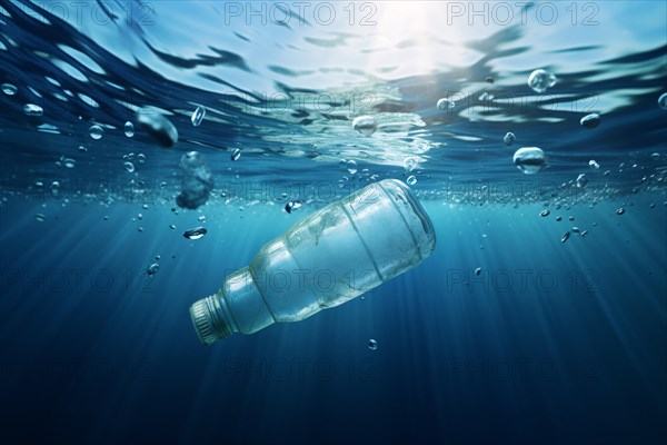 Plastic pollution concept showing plastic bottle swimming in ocean. KI generiert, generiert, AI generated