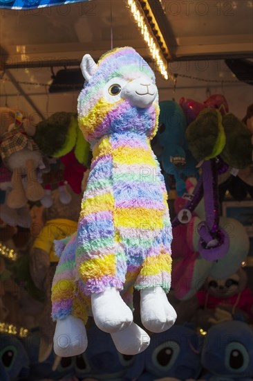 Llama, colourful stuffed animal at a lottery booth at the Bremer Osterwiese fair, Buergerweide, Bremen, Germany, Europe